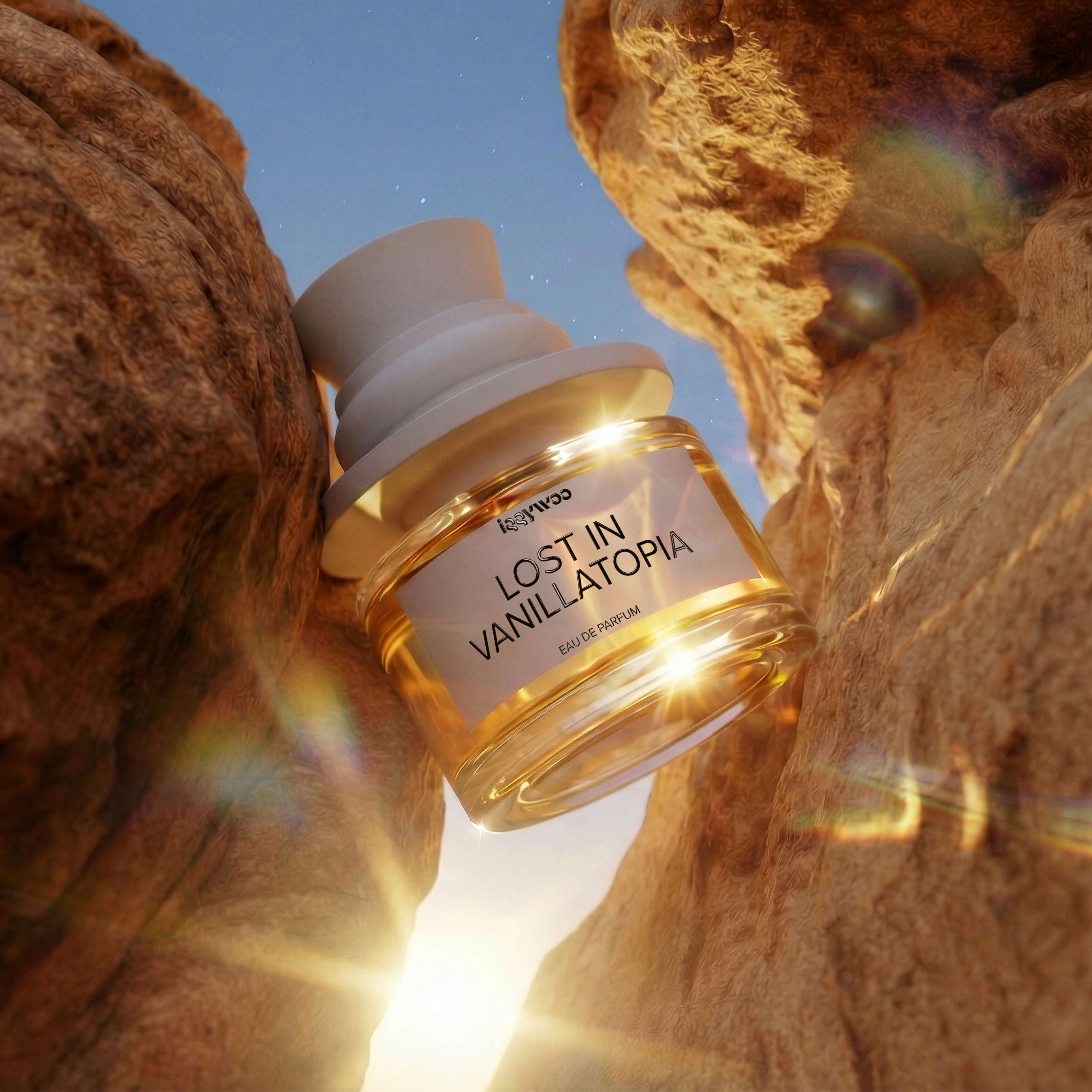 A bottle of Euphoric 'Lost in Vanilatoria' perfume displayed between two large rock formations in a desert canyon, with the sun shining through the background.