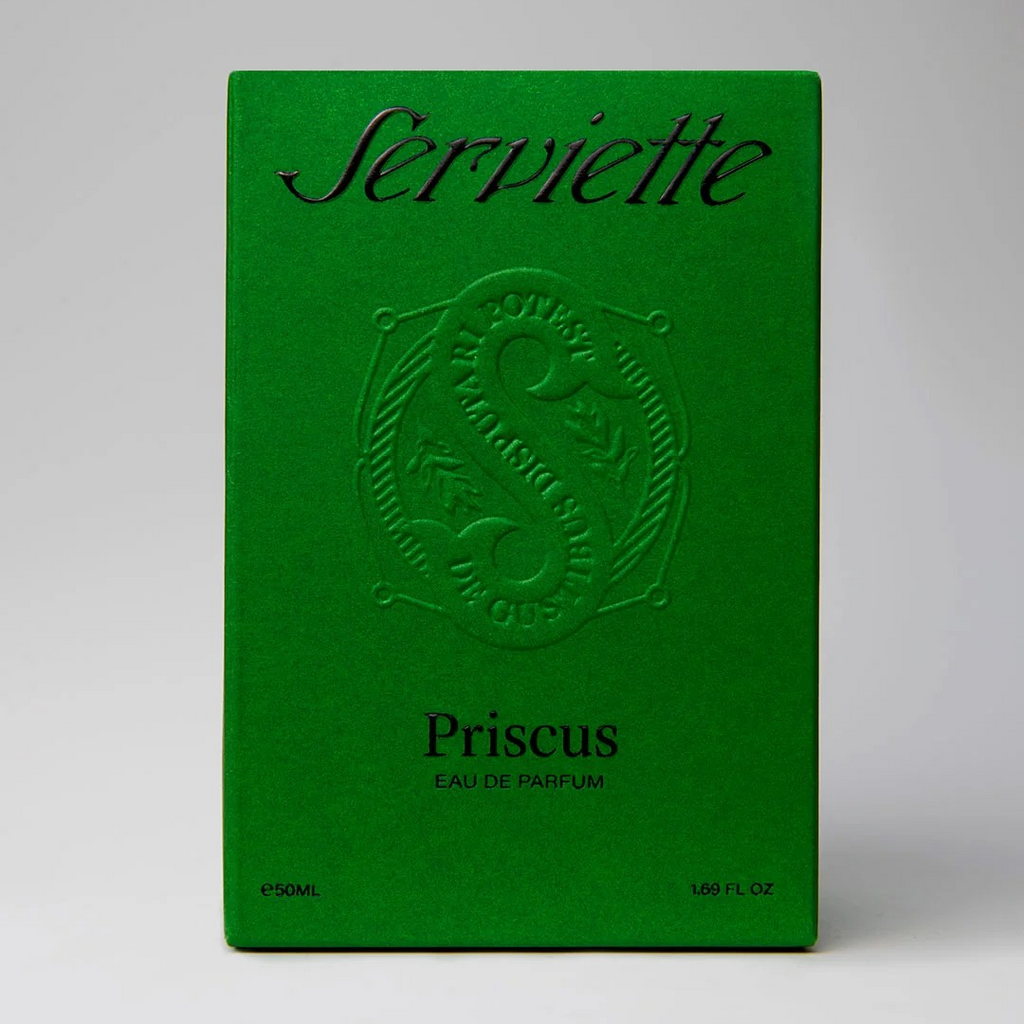 A green rectangular box for Serviette Priscus Eau de Parfum, featuring an embossed logo and black text, photographed against a neutral gray background.